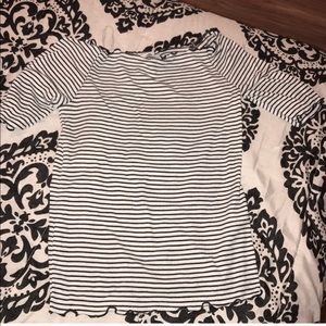 Super cute kind of off shoulder shirt.